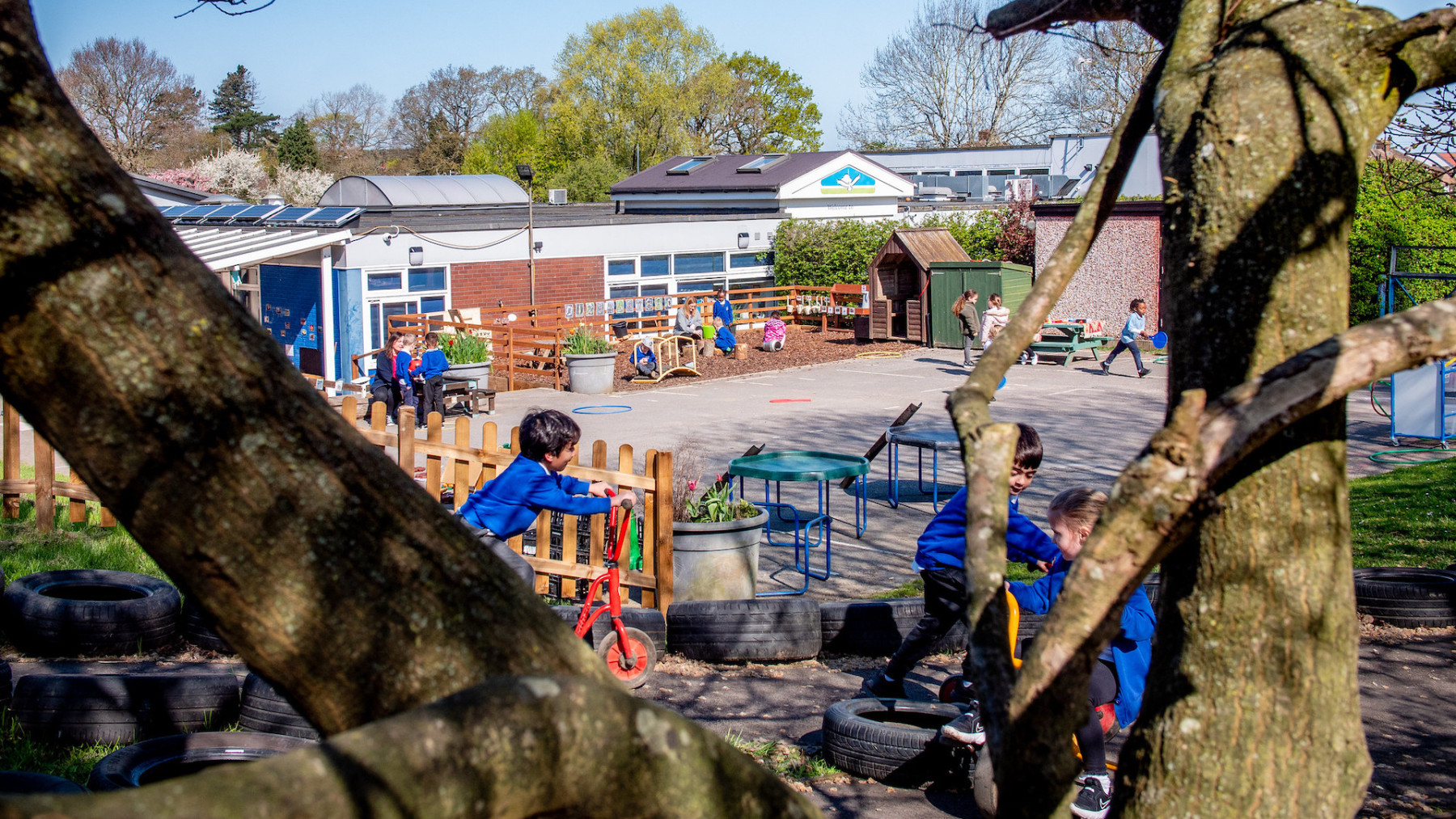 We love the Wroxham School written using wooden blocks on the grass